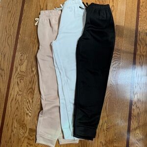 SHEIN Kids 12 Sweatpants Trio - Black, White, and Tan